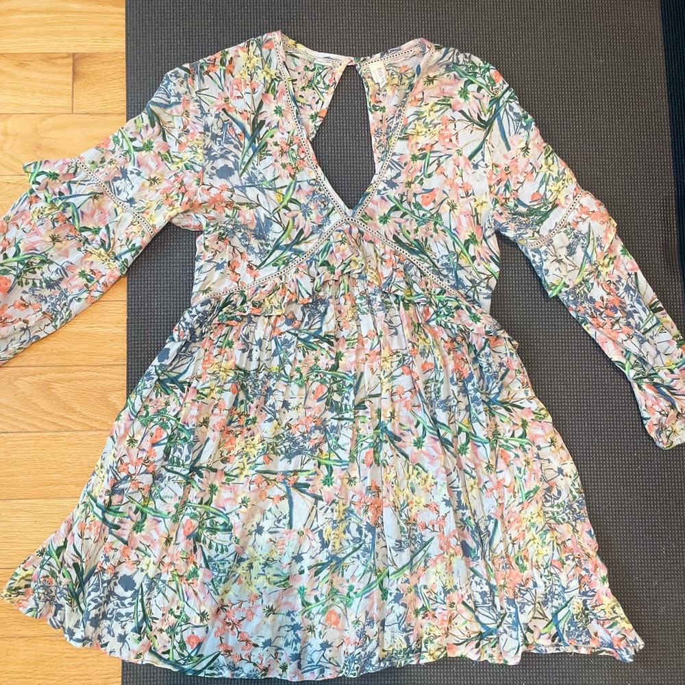 Raga floral mini dress with back cut out. Size small.